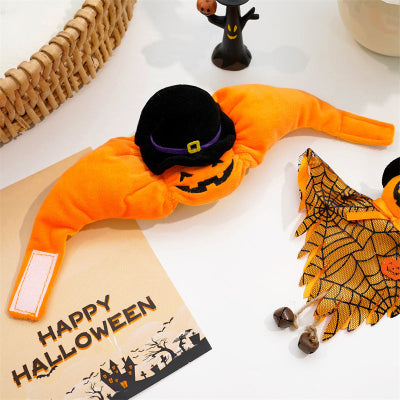 Halloween-themed dog toy with a pumpkin design on an orange bag labeled 'Happy Halloween'.