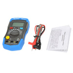 Digital multimeter with test leads and user manual on a white background