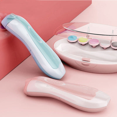 Two handheld devices, one light blue and one pink, on a pink background with a clear case containing colorful items.
