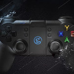 Black gaming controller with colorful buttons on a dark textured background