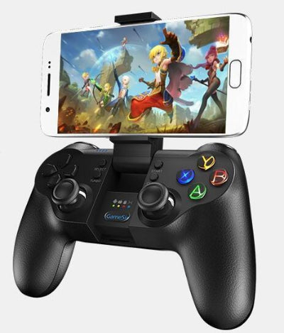 Black gaming controller with smartphone displaying a fantasy game on a white background