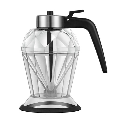 Clear blender pitcher with black handle and base on a white background