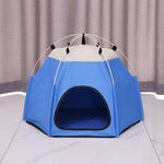 Blue pet tent with a white top on a tiled floor.