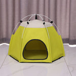 Yellow pet tent with a white top on a gray floor and brown curtain background