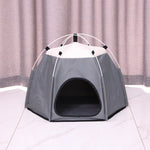 Pet tent on a tiled floor with a neutral curtain background
