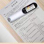 Electronic dictionary on a book with text