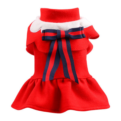 Red pet dress with a blue bow on a white background