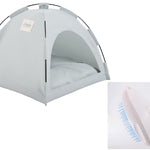 Pet tent and grooming brush on a white background
