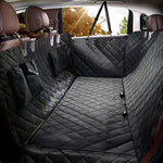 Car interior with a black quilted bench seat cover