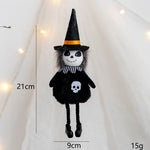 Halloween-themed plush toy with measurements on a white background