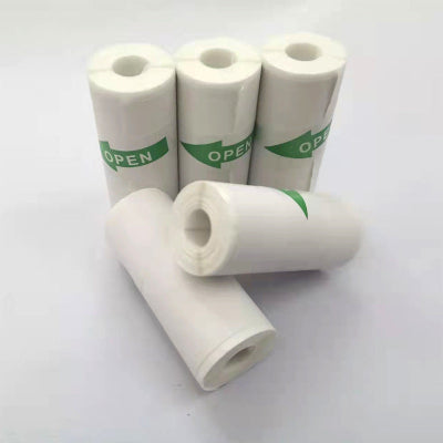 Four rolls of white paper with 'OPEN' labels on a white background