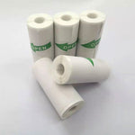 Four rolls of white paper with 'OPEN' labels on a white background