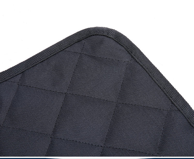 Close-up of a textured black fabric surface of Dog Car Seat Cover