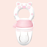 Pink and white baby teether with cat ears on a pink background