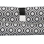 Black and white patterned clutch bag on a white background