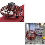 Red flying disc toy with black top and a box labeled 'Flynova Pro' on a gray surface.