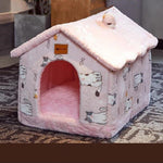 Pink pet house with cartoon designs on a patterned rug