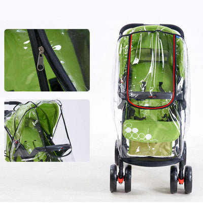 Green stroller with a transparent rain cover on a white background