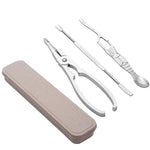 Set of travel utensils including a fork, knife, and spoon with a case on a white background