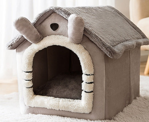 Pet house with a design resembling a hedgehog on a light background