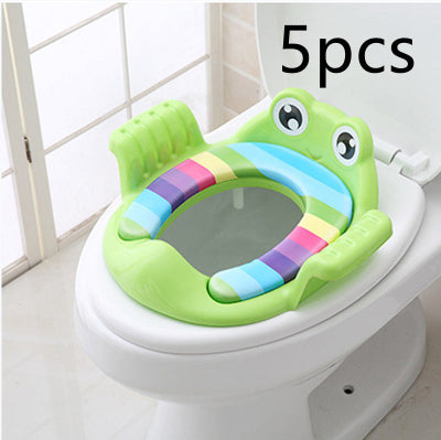 Colorful frog-shaped toilet seat on a white toilet with '5 pcs' text above.