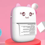 Cute cartoon-style device with pink accents on a pink background