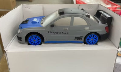 Toy car with 'W75 Super Muscle' branding in a box