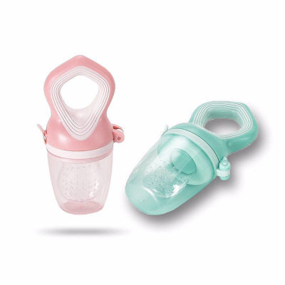 Pink and green baby food feeders on a white background