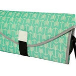 Green clutch bag with arrow pattern on a white background