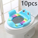 Children's toilet seat with rainbow design on a toilet