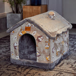 Pet house with fox pattern on a carpeted floor