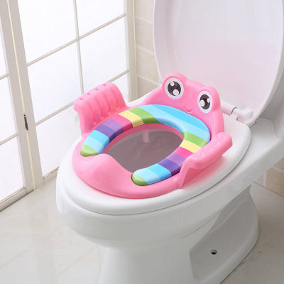 Children's toilet seat with pink octopus design on a white toilet.