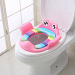 Children's toilet seat with pink octopus design on a white toilet.