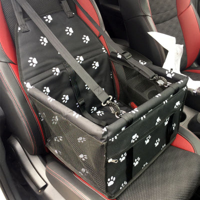 Pet car seat cover with paw pattern on a car seat
