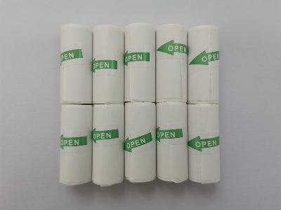 White cylindrical objects with green 'OPEN' labels on a gray background