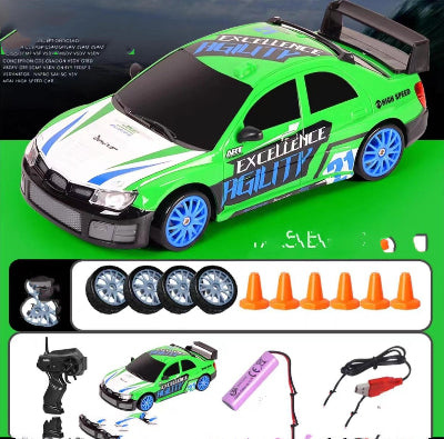 Toy car set with remote control, batteries, and accessories on a green background