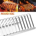 Barbecue rack with grill and roasted meat on a white background