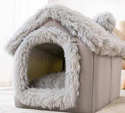 Gray pet bed with fluffy texture on a light background
