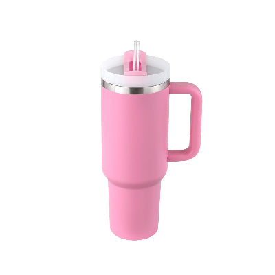 Pink insulated mug with handle and straw on a white background