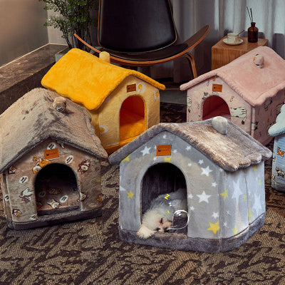 Collection of pet houses in various colors and designs on a carpeted floor.