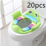Children's frog-shaped toilet seat on a toilet with '20pcs' text above.