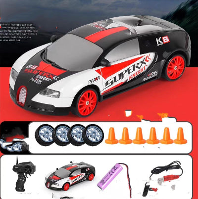 Toy car with remote control, batteries, and accessories on a red background