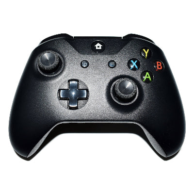 Black gaming controller on a white background