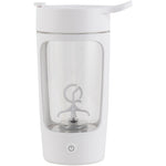 White electric tea maker with clear glass body on a white background