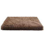 Brown fluffy pet bed on a white background