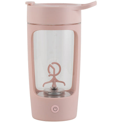 Pink travel mug with clear lid on a white background
