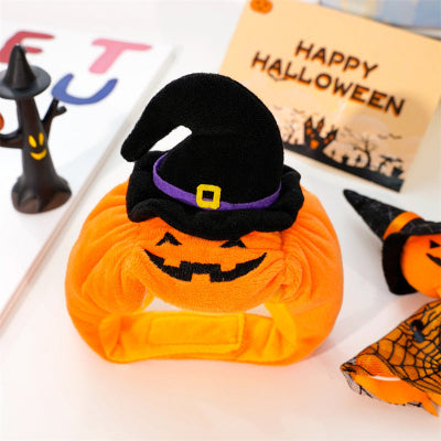 Halloween-themed product with pumpkin design and witch hat on a white background