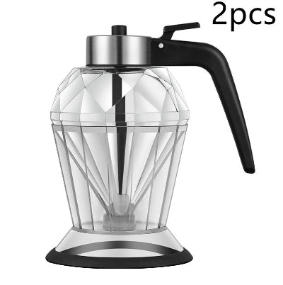 Clear blender pitcher with black handle and base on a white background, labeled '2pcs'.