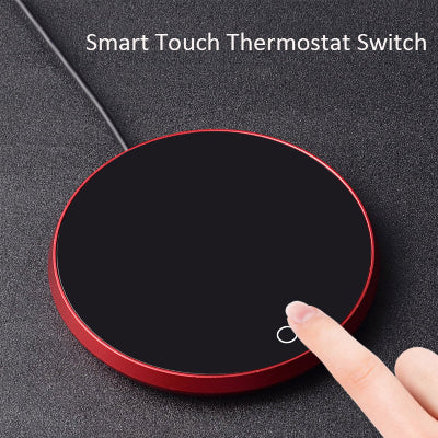 Smart touch thermostat switch with a finger about to press it on a dark background