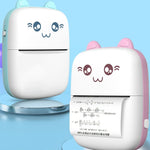 Two cute cartoon-style devices with animal ears on a blue background